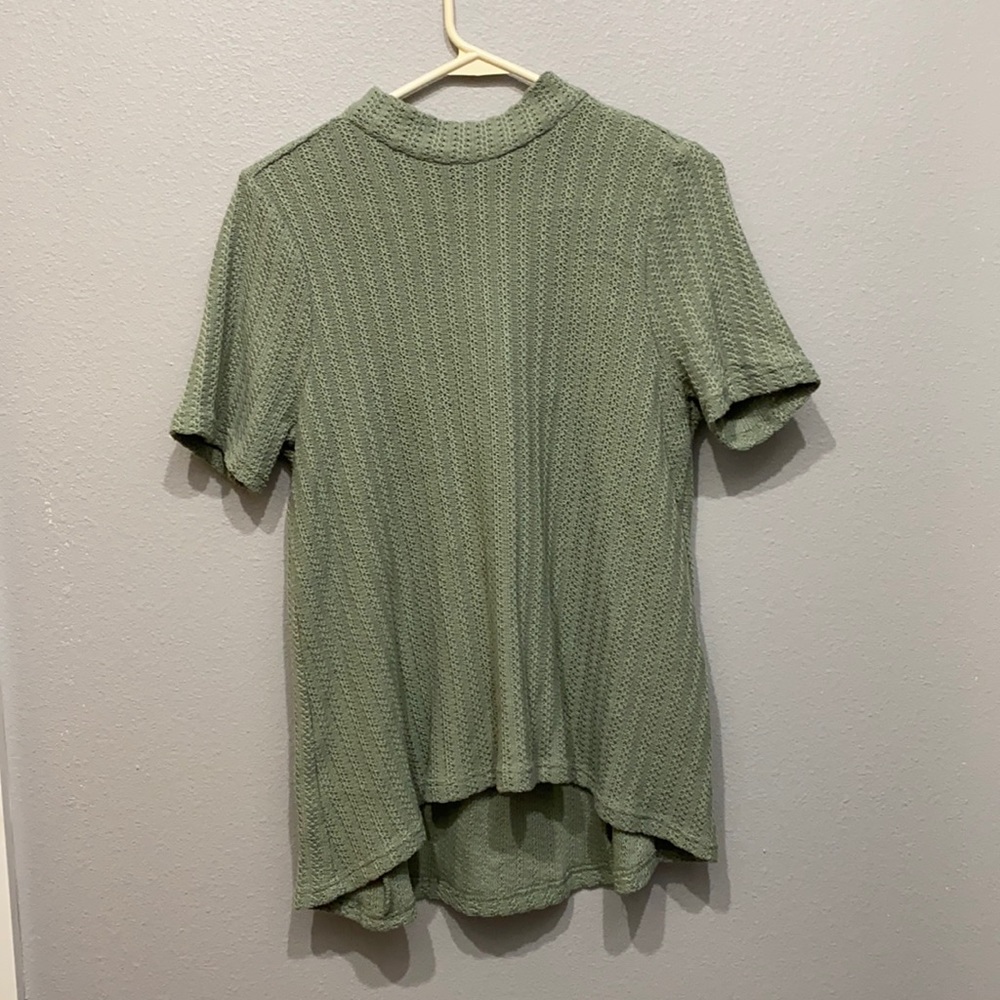 Green turtle neck top